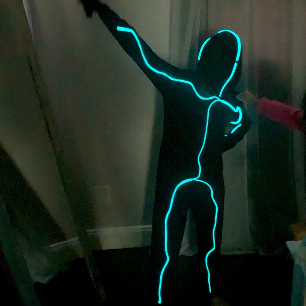 Kids Light up costume. Size M. Black with blue lights. Excellent condition!